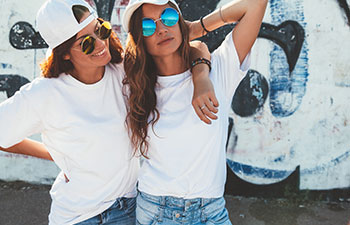 Two young women dressed casually. Marietta GA Orthodontists.