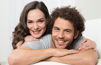 Portrait of smilling young couple.